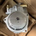 Close-up of fuel injection pump 1332280 showing precision governor and housing